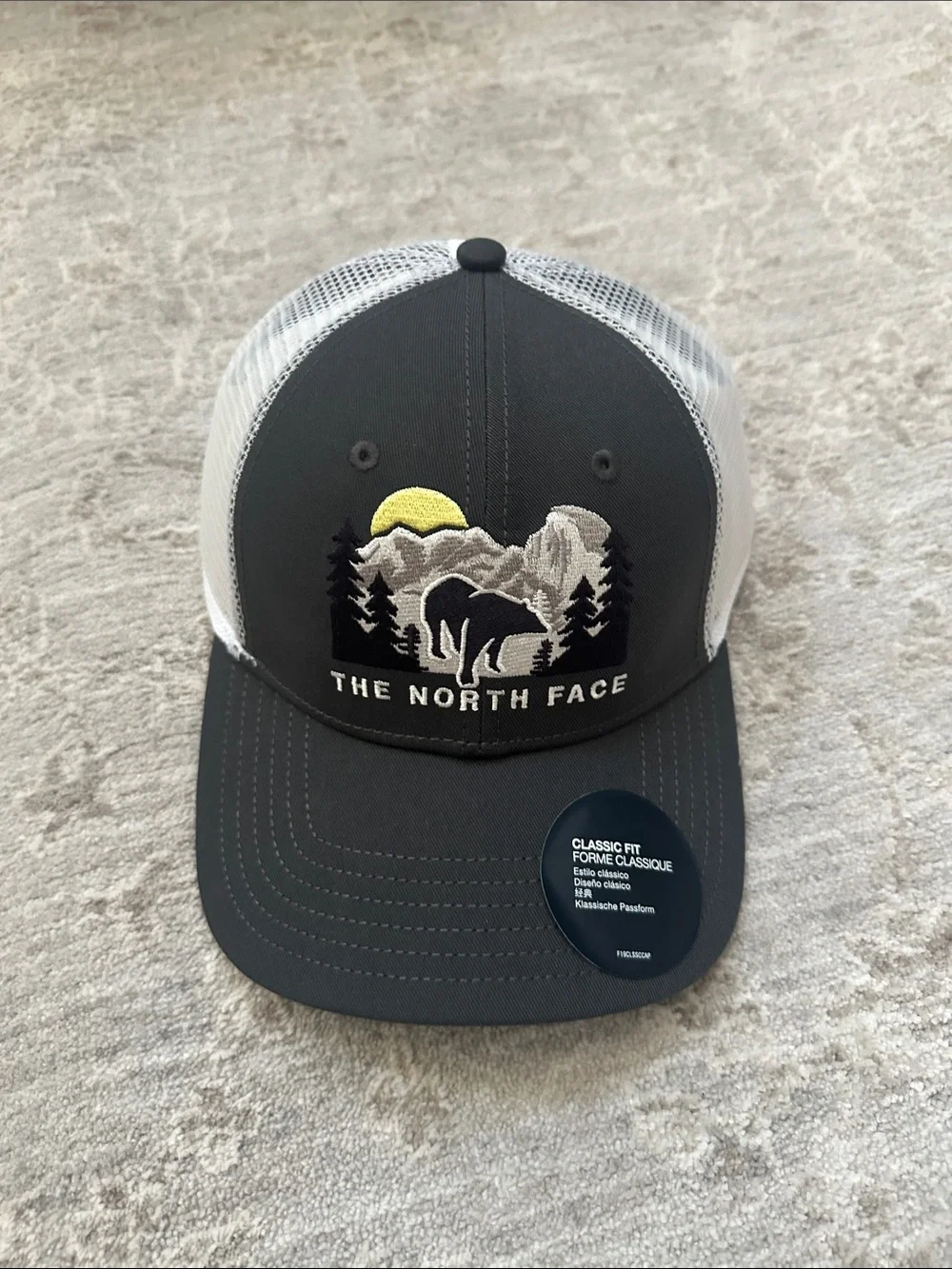 The North Face Mudder Trucker Hat White/Asphalt. Bear/Sun/Mountain. NWT’s
